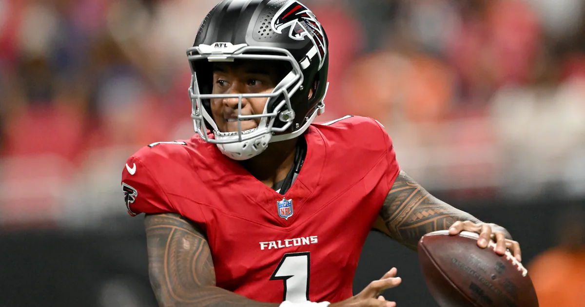Atlanta Falcons quarterback Tua Tagovailoa standing in the locker room during a game