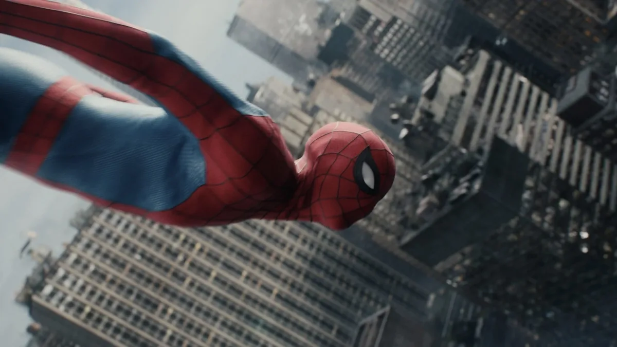 Cinematic shot of a superhero movie title display on a big theater screen