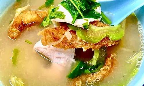 Bowl of soup at Boon Keng Road Fish Head Bee Hoon in Singapore