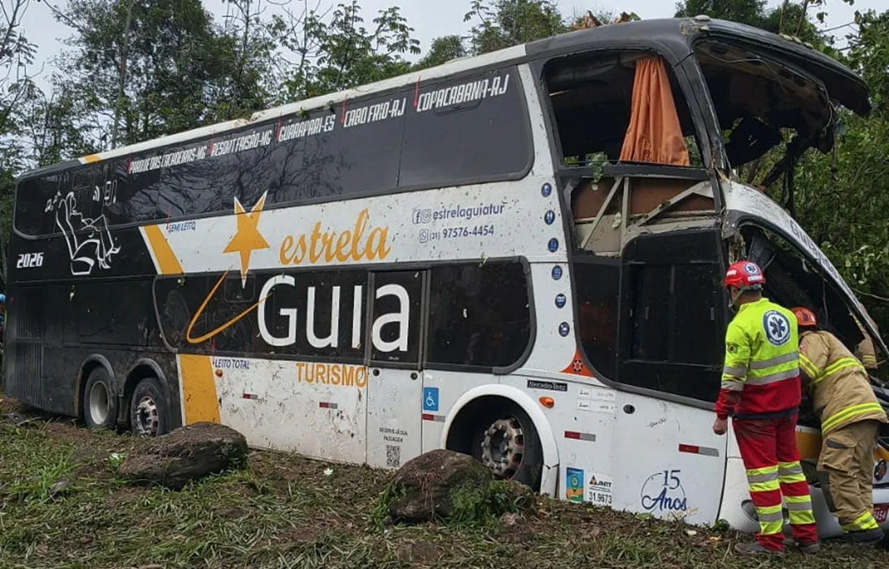 Emergency response vehicles and highway personnel at the scene of a severe tourist bus crash