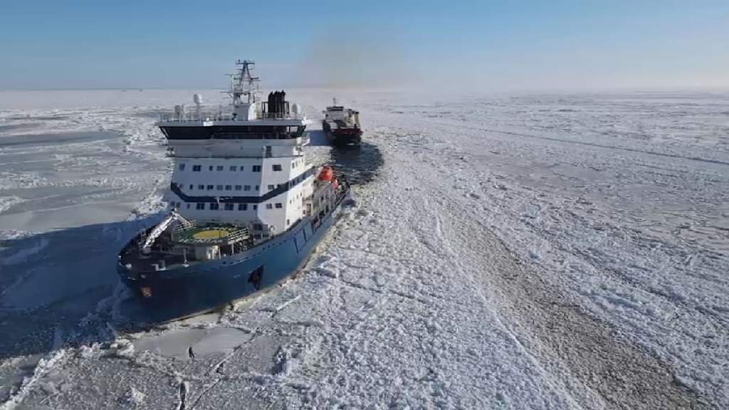 Icebreaker vessel navigating through icy waters in the Arctic