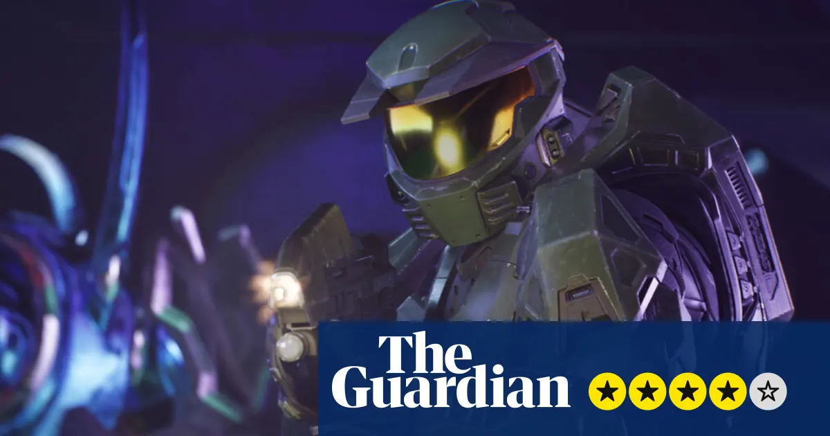 Master Chief standing on a mysterious alien ringworld under foreign skies