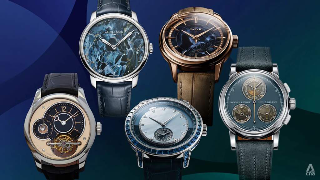 Craftsman assembling an intricate luxury timepiece inside a Swiss independent workshop