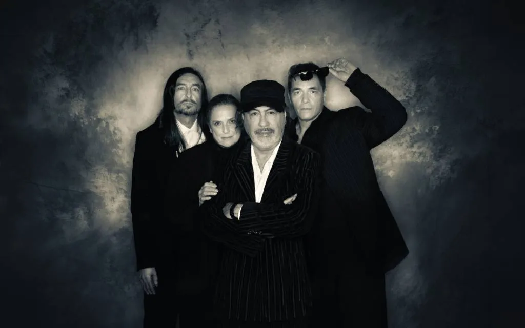 Rock supergroup Madreperla members performing together on stage