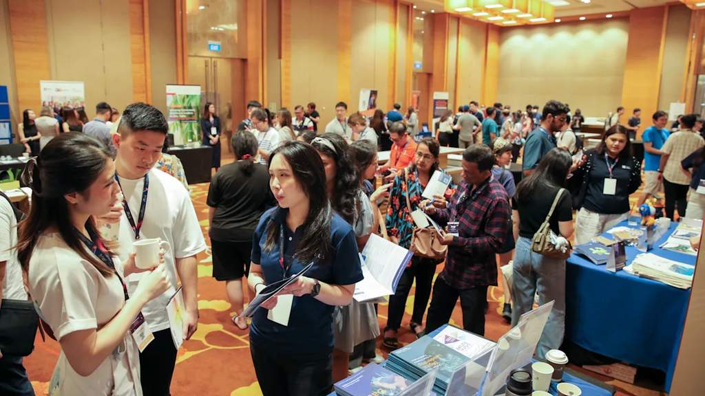 Students and faculty engaging at an educational fair