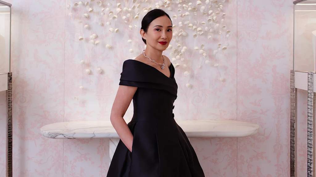 Dr Caroline Heah posing in her recreated 1957 Dior Caracas haute couture gown