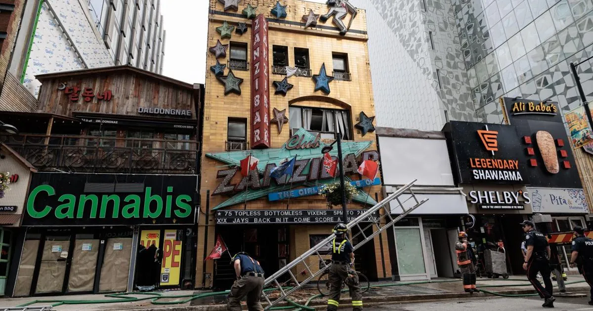 Firefighters battling a massive blaze at Zanzibar Tavern in downtown Toronto