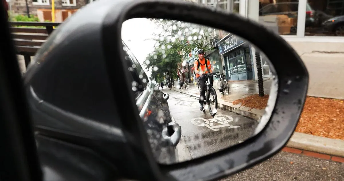 Bicycles parked near a busy urban street in Toronto
